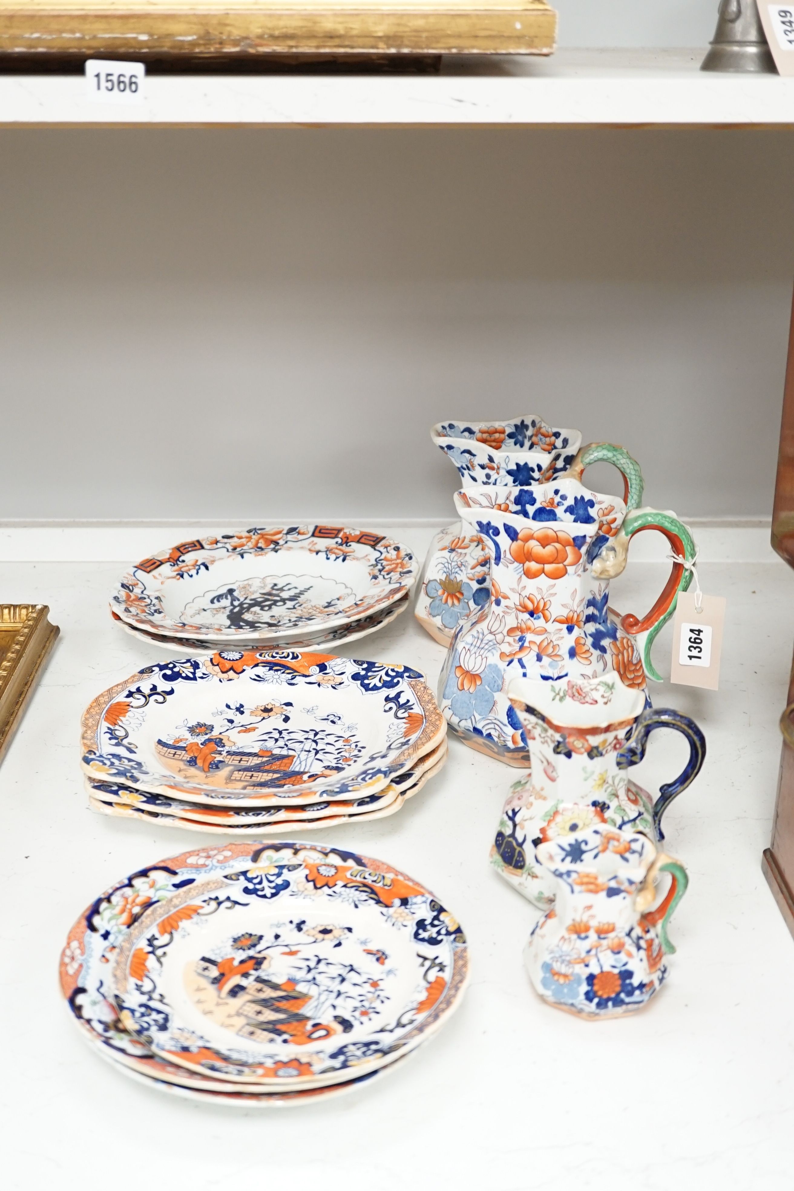 Four graduated Mason’s hydra jugs, tallest 19cm., and eight various ironstone or earthenware plates